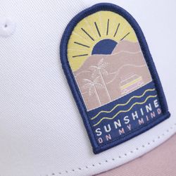 Caps W. Badge